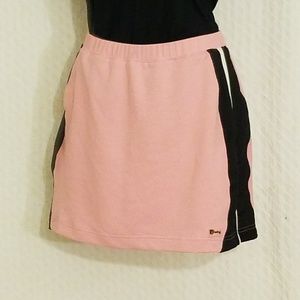 Pink Swing golf skort with tuxedo strip
